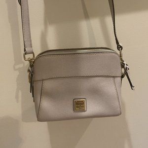 Dooney and Bourke white crossbody with gold hardware
